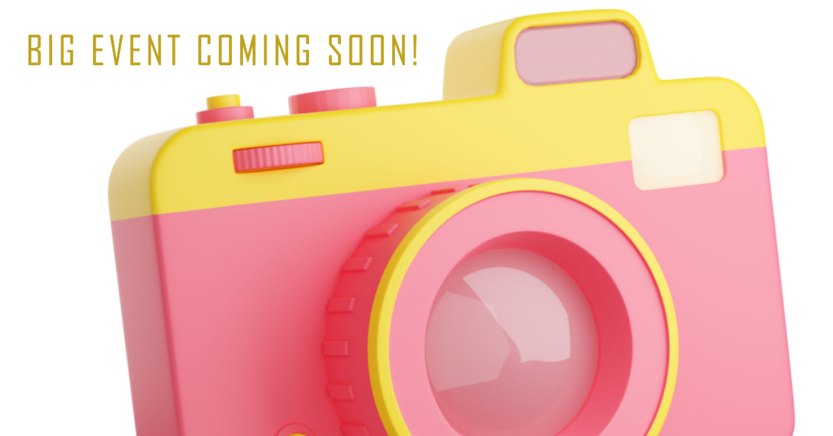 a photocamera in pink and yellow colors