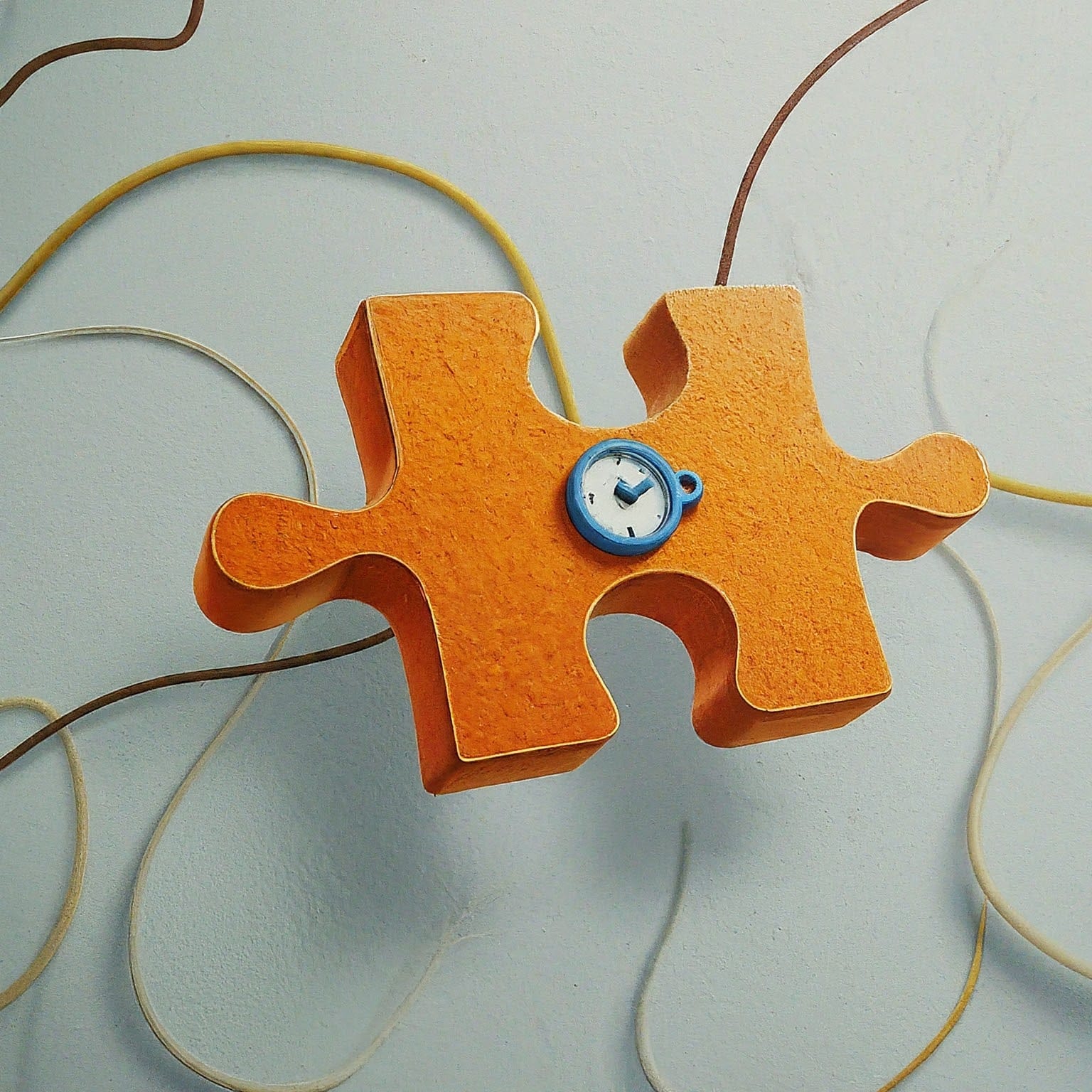 puzzle piece and a clock 